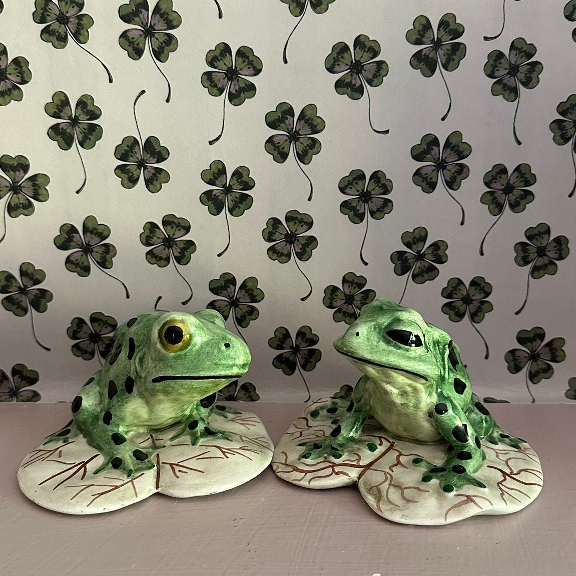 A pair of 1960s had painted ceramic frogs - FLORA BLACK